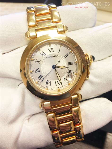 solid gold Cartier watch